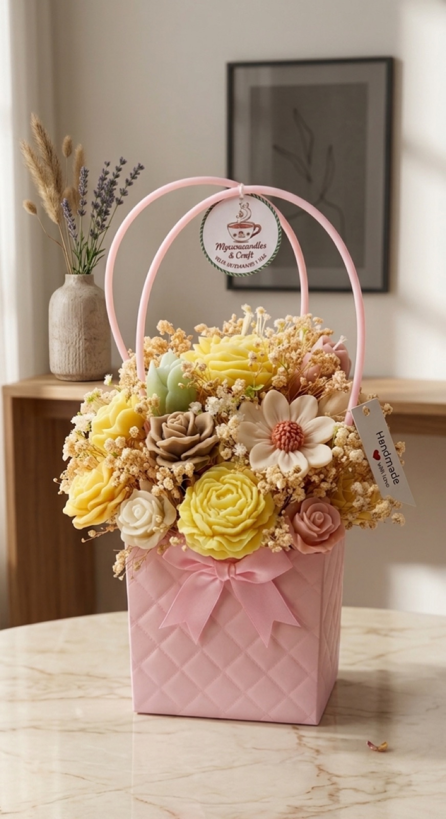 Pink gift basket filled with yellow and cream handmade flowers